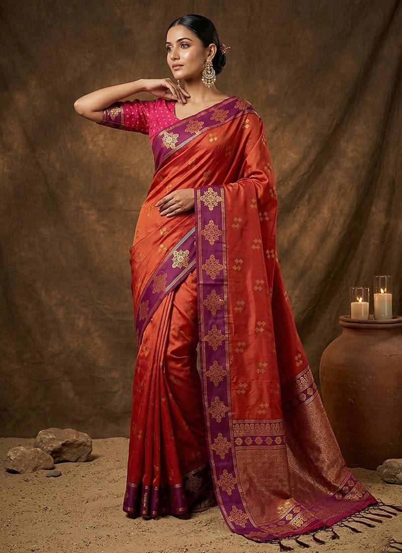 Rust orange  zari woven banarasi silk blend saree with blouse piece