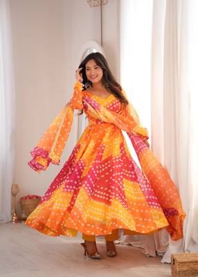 Orange printed tebby organza gown pant set with dupatta 1