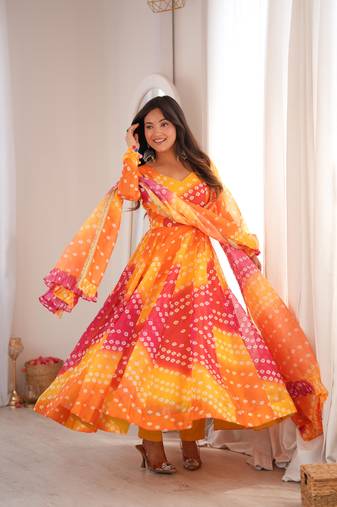 Orange printed tebby organza gown pant set with dupatta