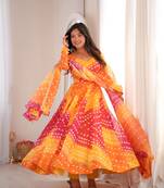 Orange printed tebby organza gown pant set with dupatta