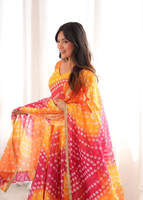 Orange printed tebby organza gown pant set with dupatta 4