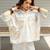 Cream white printed cotton shirt