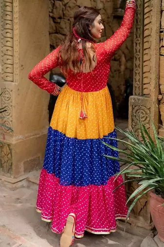 Multicolor faux georgette mirror work ruffle gown with embroidered lace border