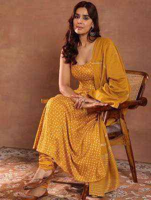 Womens mustard printed rayon anarkali kurta with churidar & dupatta 1