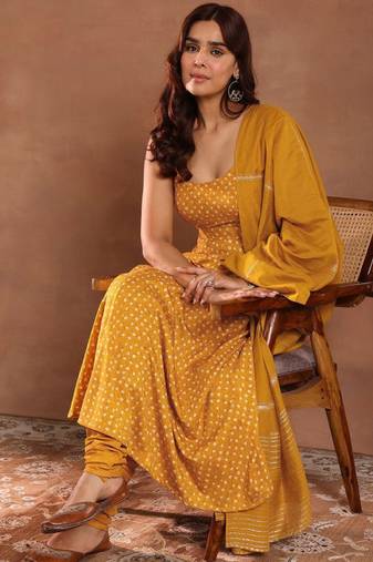 Womens mustard printed rayon anarkali kurta with churidar & dupatta