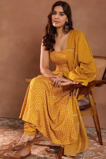 Womens mustard printed rayon anarkali kurta with churidar & dupatta