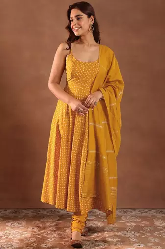 Womens mustard printed rayon anarkali kurta with churidar & dupatta