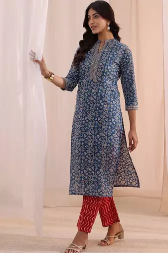 Women geometric printed kurta with trousers & dupatta