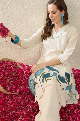 Women floral embroidered regular thread work pure cotton kurta with palazzos