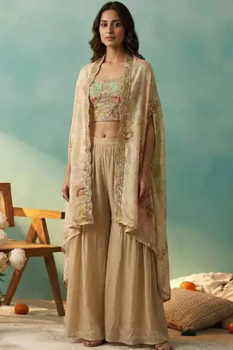 Women floral embroidered regular sequinned kurti with palazzos & with dupatta