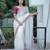 Cream banarasi silk embroidered sequins work heavy look ethnic saree with blouse
