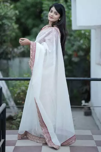 Cream banarasi silk embroidered sequins work heavy look ethnic saree with blouse