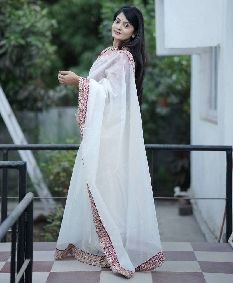 Cream banarasi silk embroidered sequins work heavy look ethnic saree with blouse