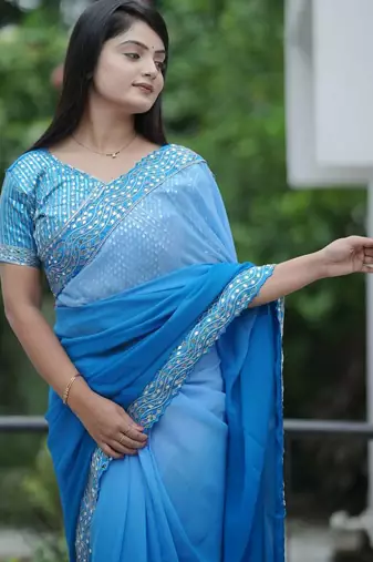 Teal faux georgette embroidered mirror work heavy look ethnic saree with blouse