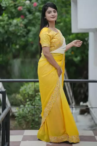 Yellow faux georgette embroidered mirror work heavy look ethnic saree with blouse