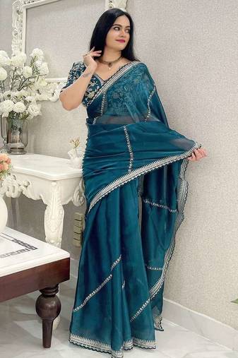 Green silk embroidered sequins work heavy look ethnic saree with blouse