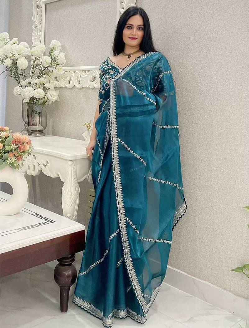 Green silk embroidered sequins work heavy look ethnic saree with blouse