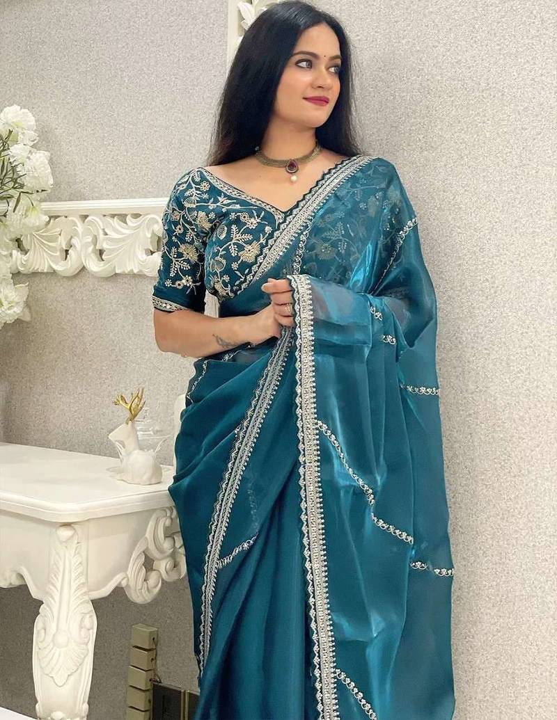 Green silk embroidered sequins work heavy look ethnic saree with blouse