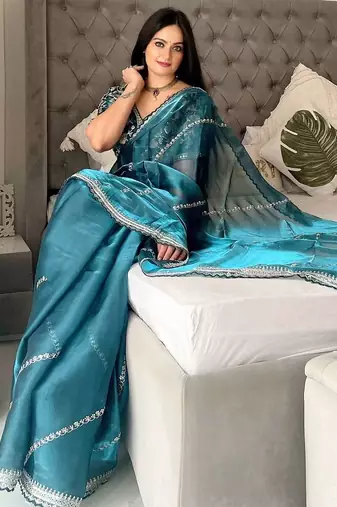 Green silk embroidered sequins work heavy look ethnic saree with blouse