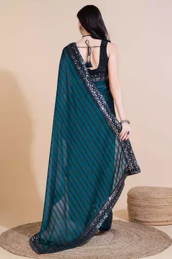 Green silk embroidered sequins work heavy look ethnic saree with blouse