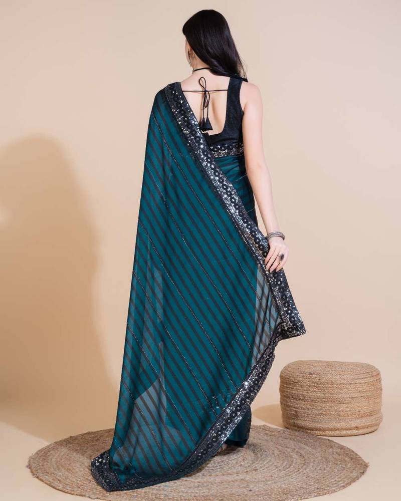 Green silk embroidered sequins work heavy look ethnic saree with blouse