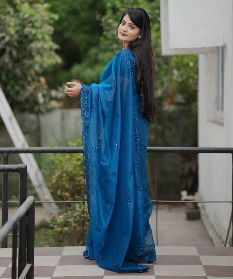 Teal net embroidered sequins work heavy look ethnic saree with blouse