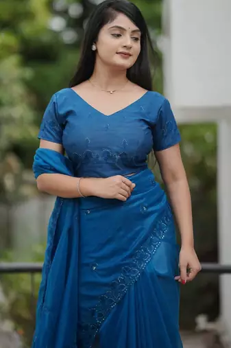 Teal net embroidered sequins work heavy look ethnic saree with blouse