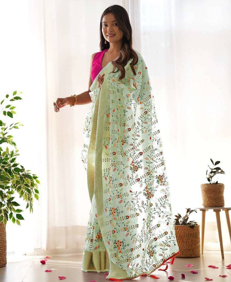 Green organza embroidered zari woven heavy look ethnic saree with blouse