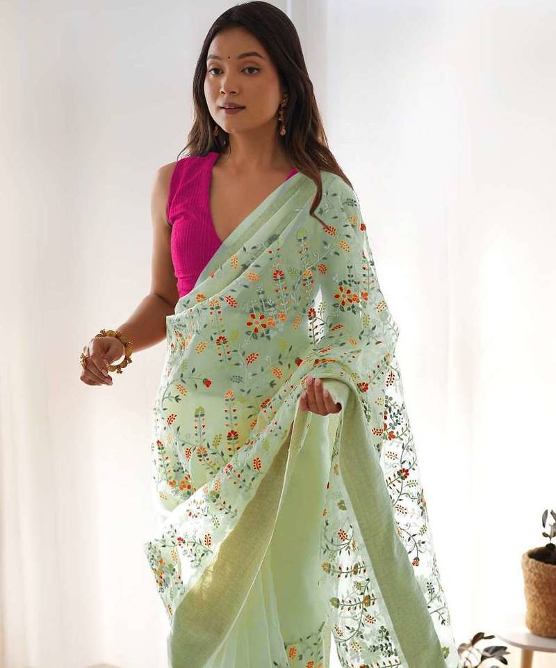 Green organza embroidered zari woven heavy look ethnic saree with blouse