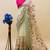 Green organza embroidered zari woven heavy look ethnic saree with blouse