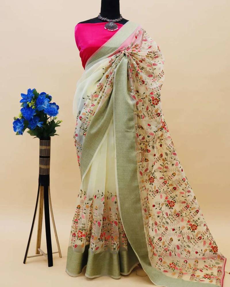 Green organza embroidered zari woven heavy look ethnic saree with blouse