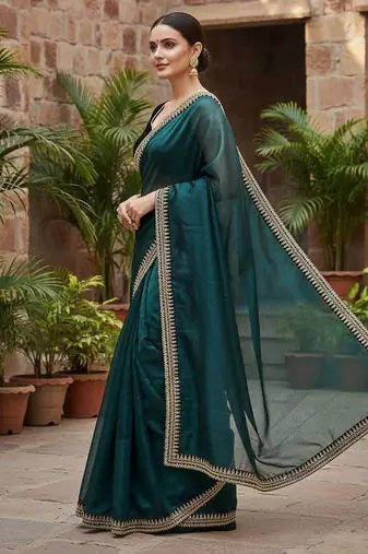 Teal net embroidered sequins work heavy look ethnic saree with blouse