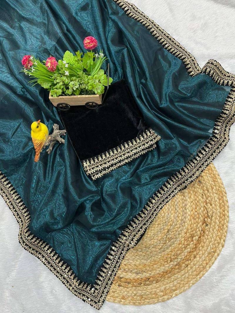 Teal net embroidered sequins work heavy look ethnic saree with blouse