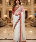 White organza embroidered sequins work heavy look ethnic saree with blouse
