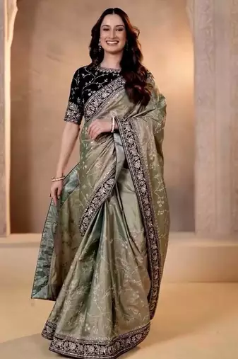 Cream silk embroidered sequins work heavy look ethnic saree with blouse