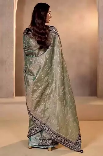 Cream silk embroidered sequins work heavy look ethnic saree with blouse