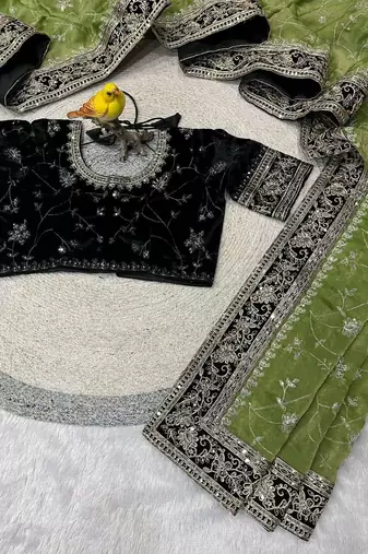 Green silk embroidered sequins work heavy look ethnic saree with blouse