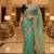 Green satin embroidered thread work heavy look ethnic saree with blouse