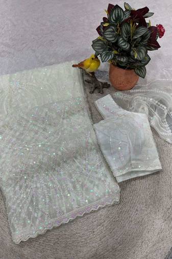White net embroidered sequins work heavy look ethnic saree with blouse