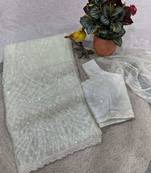 White net embroidered sequins work heavy look ethnic saree with blouse