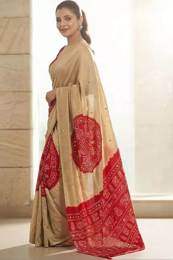 Cream silk embroidered mirror work heavy look ethnic saree with blouse