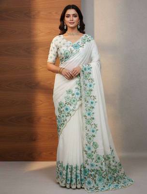 Green organza printed floral print heavy look ethnic saree with blouse 1