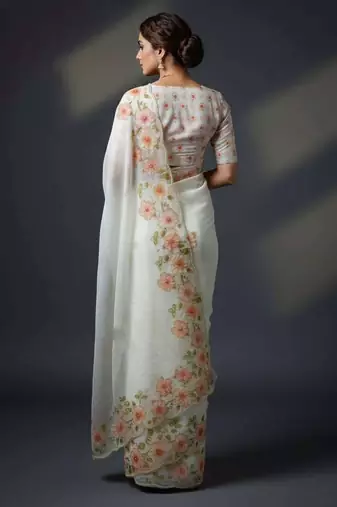 Peach organza printed floral print heavy look ethnic saree with blouse