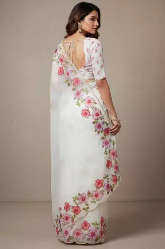 Pink organza printed floral print heavy look ethnic saree with blouse