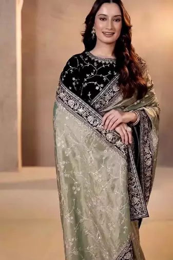Cream silk embroidered sequins work heavy look ethnic saree with blouse