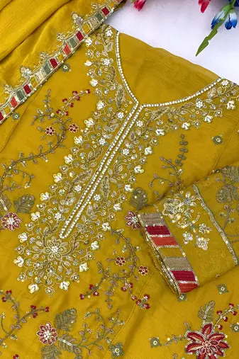 yellow chiffon semi stitched suit with embroidery & sequence work