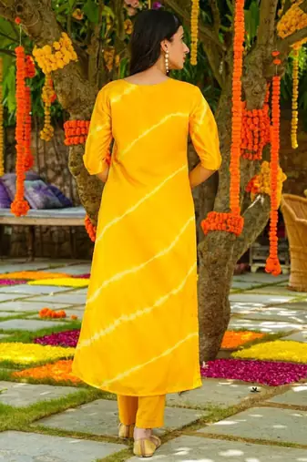 Yellow muslin silk blend kurti pant set