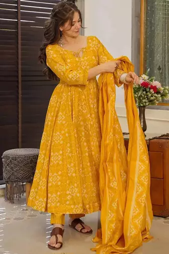 Yellow muslin silk blend digital printed kurti with palazzo set