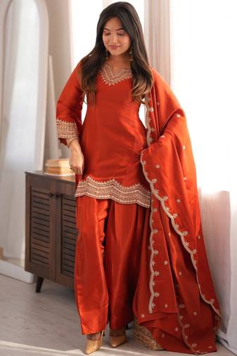 Rust orange embroidered glass roman silk kurta set with farshi salwar and designer dupatta