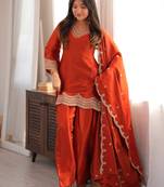Rust orange embroidered glass roman silk kurta set with farshi salwar and designer dupatta